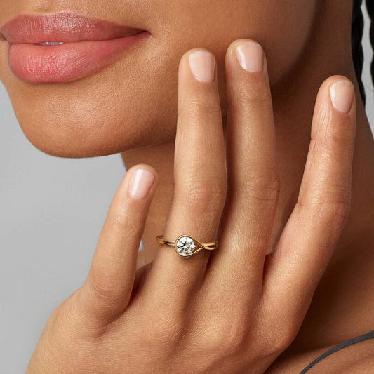 Teardrop Solitaire Twist Ring