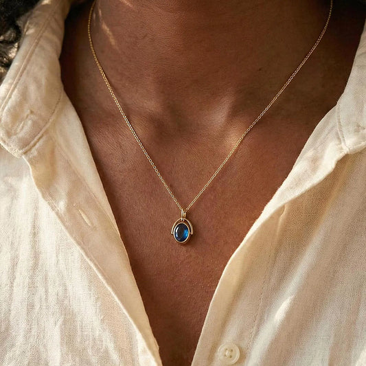 Arched Frame Blue Oval Spinner Pendant Necklace