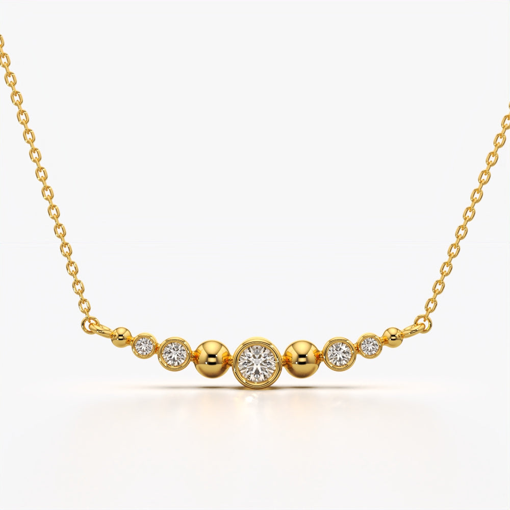 Bezel and bead smile bar necklace sitting below the collarbone