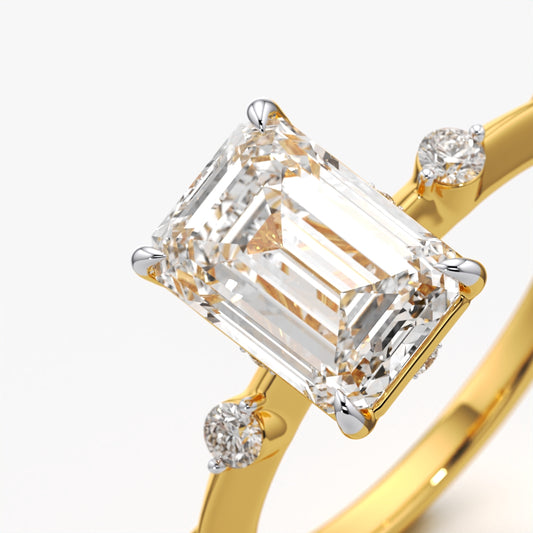 Emerald Cut Solitaire Ring with Scattered Stone Band