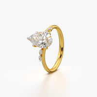 Pear Cut Solitaire Ring with Marquise Accents