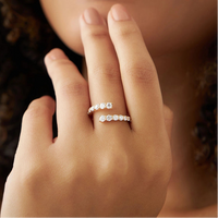 Graduated Round Stone Bypass Open Ring