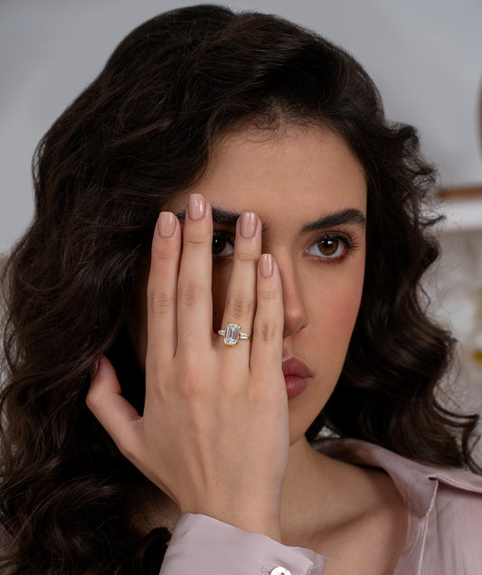 Emerald Cut Bezel Three Stone Ring
