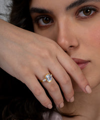 Emerald Cut Solitaire Bezel Three Stone Ring