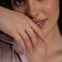 Alternating Oval and Round Stone Half Eternity Ring