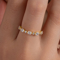 Alternating Oval and Round Stone Half Eternity Ring