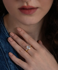 Emerald Cut Three Stone Tapered Baguette Ring