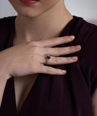 Blue Oval Centre Ring with Cluster Side Stones
