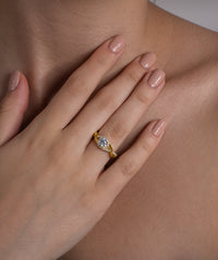 Entwined Halo Round Solitaire Ring