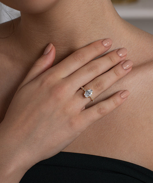 Oval Solitaire & Marquise Vine Ring