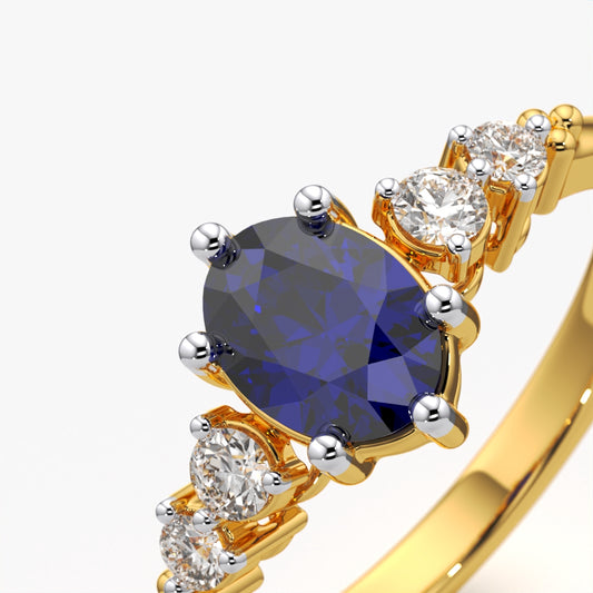 Oval Blue Diamond Ring with Graduated Moissanite Side Stones