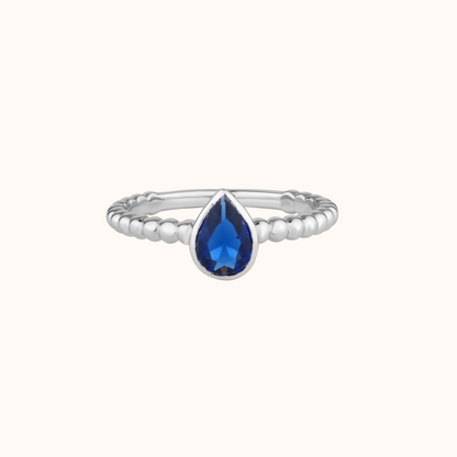 Elegant Blue Pear Solitaire Ring