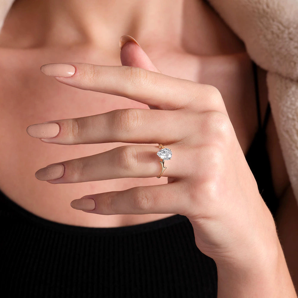 Pear Cut Thorn Band Solitaire Ring