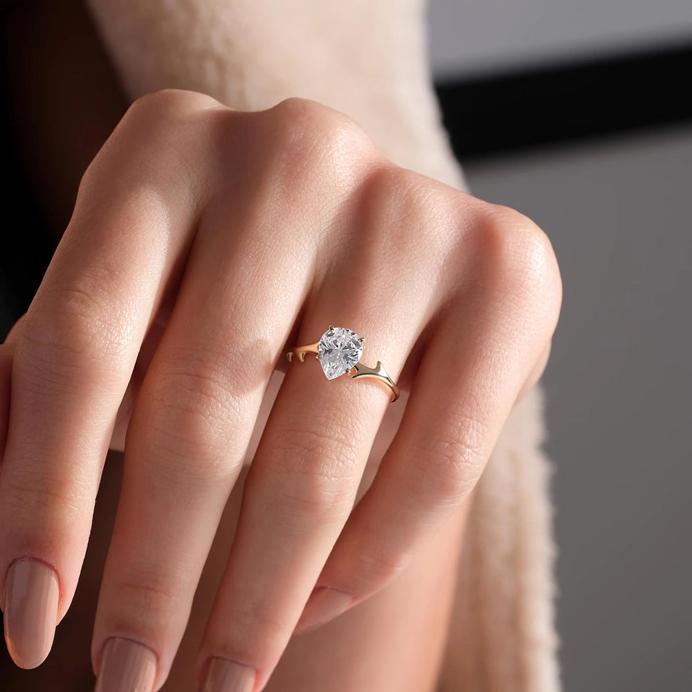 Pear Cut Thorn Band Solitaire Ring