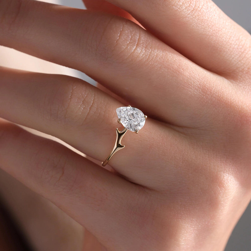 Pear Cut Thorn Band Solitaire Ring