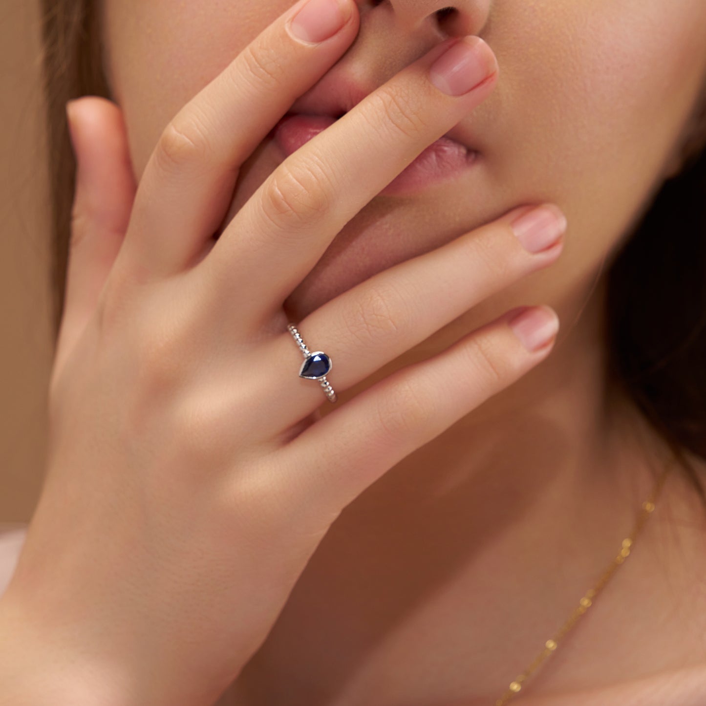 Elegant Blue Pear Solitaire Ring