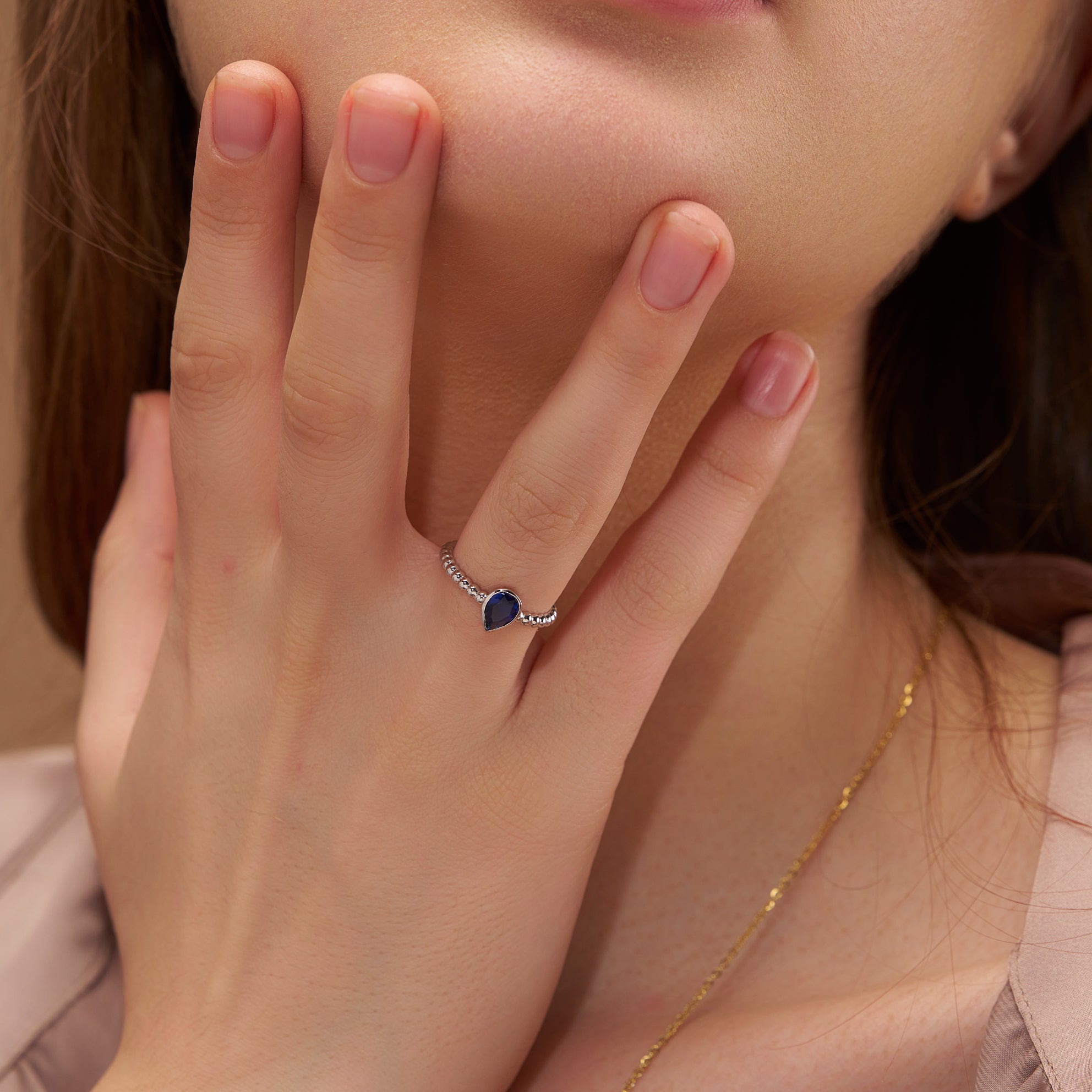 Elegant Blue Pear Solitaire Ring