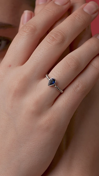 Elegant Blue Pear Solitaire Ring