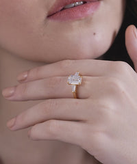 Emerald Cut Three Stone Tapered Baguette Ring