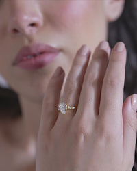 Pear Cut Solitaire Ring with Marquise Accents